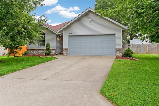 759 S Troy Ave, Springfield, MO 65802 - view of front facade featuring brick siding, driveway, and an attached garage