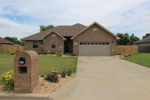 654 Boardwalk, Seymour, MO 65746 - view of front of property featuring an attached garage, brick siding, concrete driveway, and a shingled roof