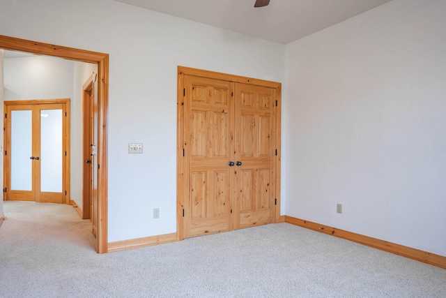 1466 S Natchez Rd, Republic, MO 65738 - unfurnished bedroom featuring carpet floors, french doors, and a ceiling fan