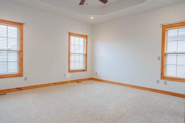 1466 S Natchez Rd, Republic, MO 65738 - spare room featuring ceiling fan, healthy amount of natural light, carpet, recessed lighting, and a tray ceiling
