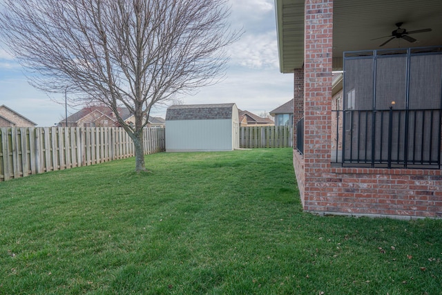 1466 S Natchez Rd, Republic, MO 65738 - fenced backyard with a ceiling fan and a shed