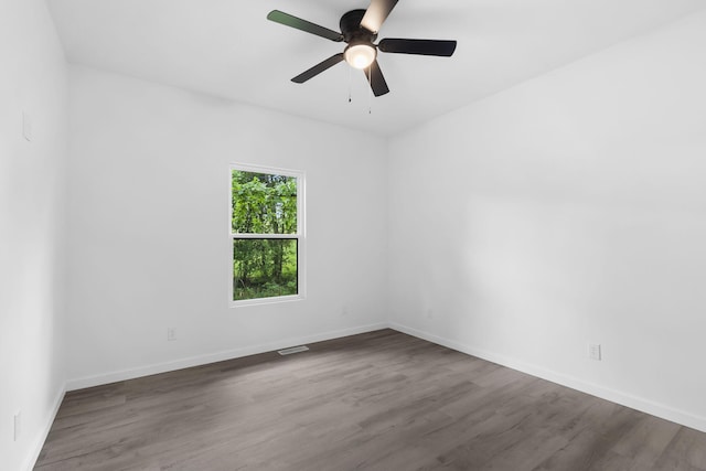 804 Iris Ave, Crane, MO 65633 - spare room with wood finished floors and ceiling fan