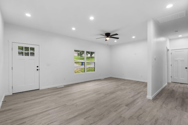 804 Iris Ave, Crane, MO 65633 - unfurnished living room featuring plenty of natural light, ceiling fan, light wood-style flooring, and recessed lighting