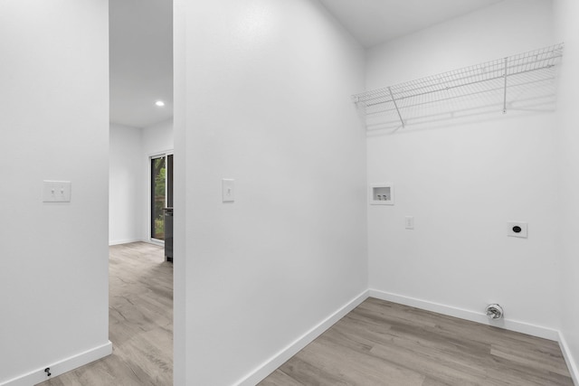 804 Iris Ave, Crane, MO 65633 - laundry area featuring electric dryer hookup, washer hookup, light wood finished floors, and recessed lighting
