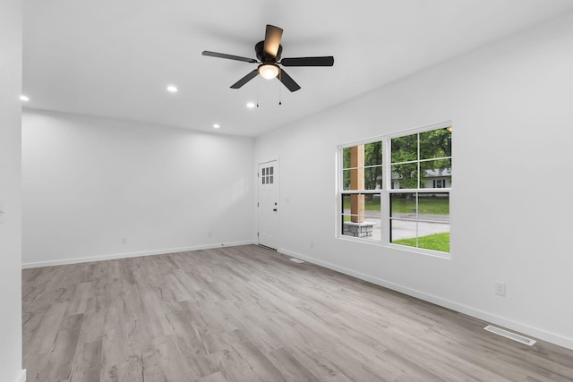 804 Iris Ave, Crane, MO 65633 - spare room with wood finished floors, a ceiling fan, and recessed lighting
