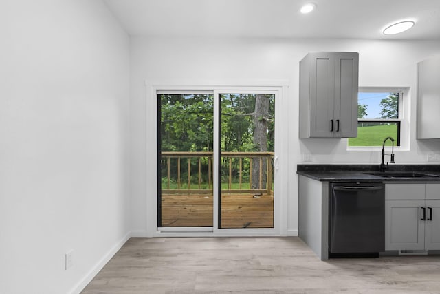804 Iris Ave, Crane, MO 65633 - kitchen with dishwasher, gray cabinetry, dark stone counters, light wood finished floors, and recessed lighting