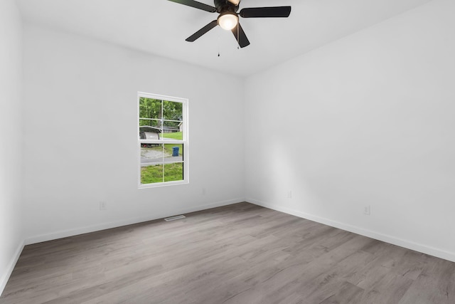 804 Iris Ave, Crane, MO 65633 - unfurnished room featuring wood finished floors and ceiling fan