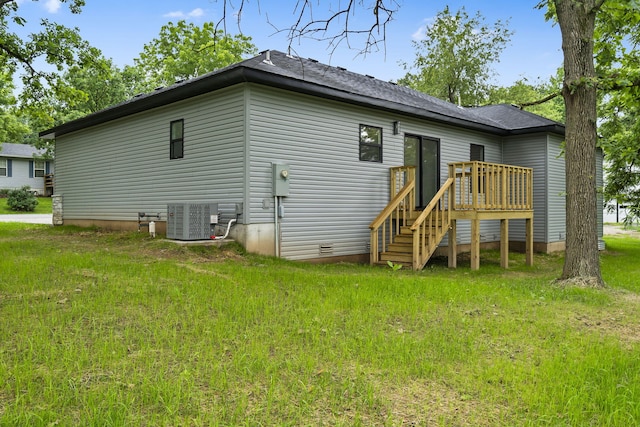 804 Iris Ave, Crane, MO 65633 - back of house featuring a yard and a deck