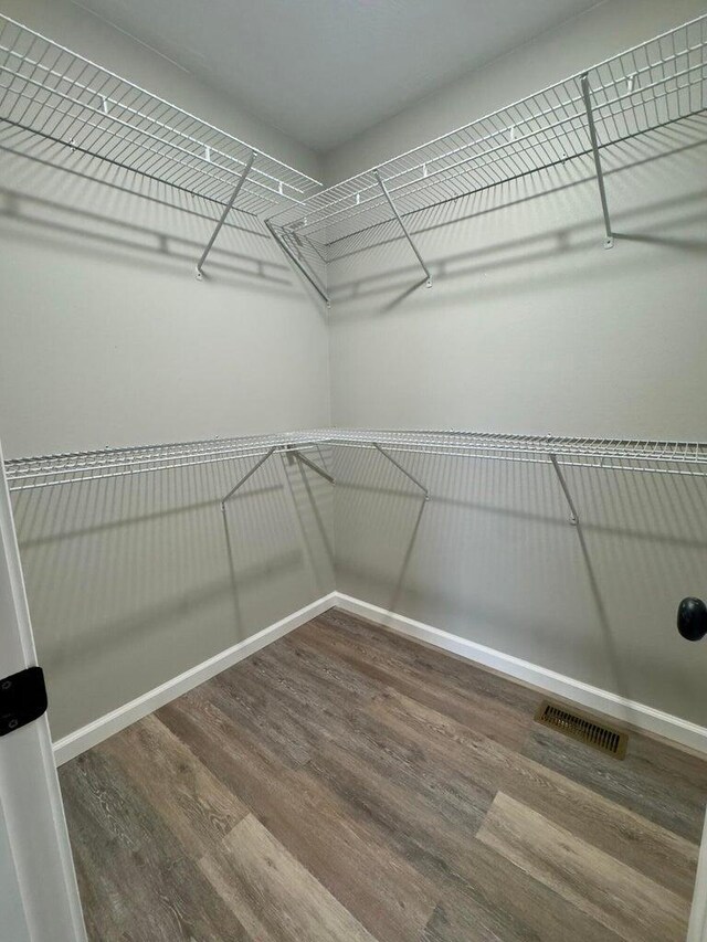 2605 Country Dr, Mountain Grove, MO 65711 - spacious closet with wood finished floors