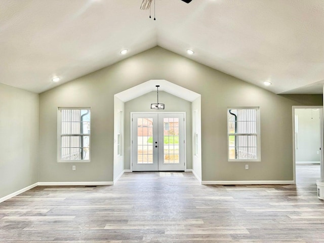 2605 Country Dr, Mountain Grove, MO 65711 - unfurnished living room with lofted ceiling, a ceiling fan, wood finished floors, french doors, and recessed lighting