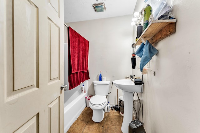 1673 E Chestnut St, Springfield, MO 65802 - bathroom with toilet and tile patterned floors