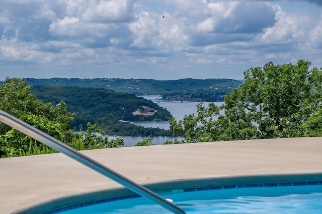 6089 State Highway Dd Unit 103, Branson West, MO 65737 - view of swimming pool featuring a water view