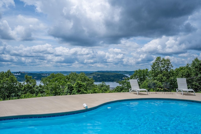 6089 State Highway Dd Unit 103, Branson West, MO 65737 - swimming pool featuring a patio