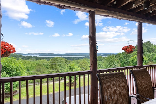 6089 State Highway Dd Unit 103, Branson West, MO 65737 - wooden deck with a forest view
