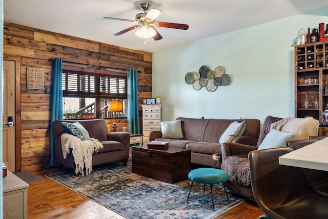 6089 State Highway Dd Unit 103, Branson West, MO 65737 - living room with wooden walls, a ceiling fan, and wood finished floors