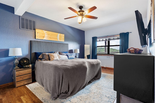 6089 State Highway Dd Unit 103, Branson West, MO 65737 - bedroom with wood finished floors and a ceiling fan
