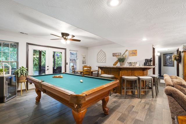 417 Panorama Dr, Cape Fair, MO 65624 - playroom with a bar, wood finished floors, french doors, billiards table, and a ceiling fan