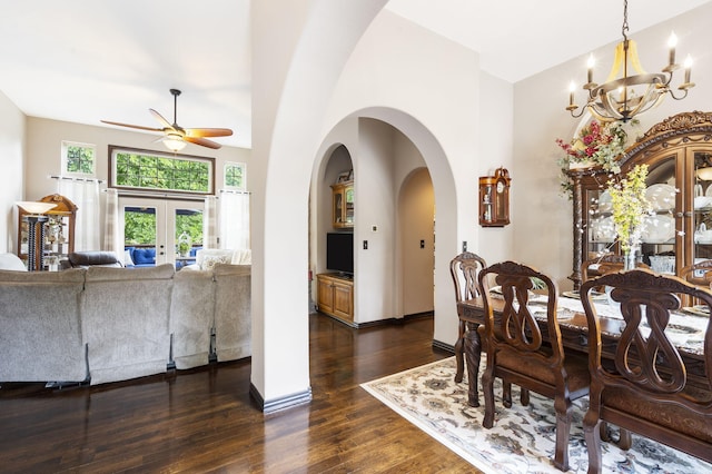 417 Panorama Dr, Cape Fair, MO 65624 - dining room featuring a ceiling fan, dark wood-type flooring, arched walkways, and a chandelier