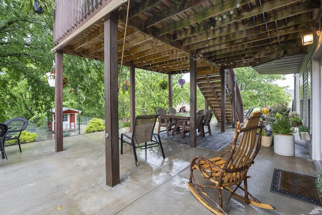417 Panorama Dr, Cape Fair, MO 65624 - view of patio with stairway and outdoor dining area