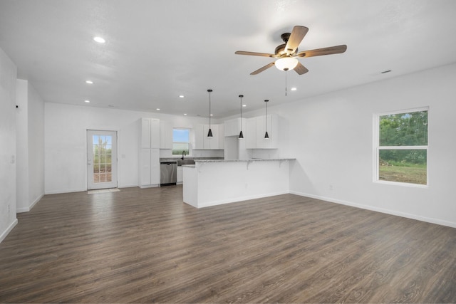 503 Valley View St, Carl Junction, MO 64834 - unfurnished living room with dark wood-style flooring, recessed lighting, and a ceiling fan
