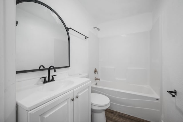 503 Valley View St, Carl Junction, MO 64834 - full bath featuring vanity, wood finished floors, and washtub / shower combination