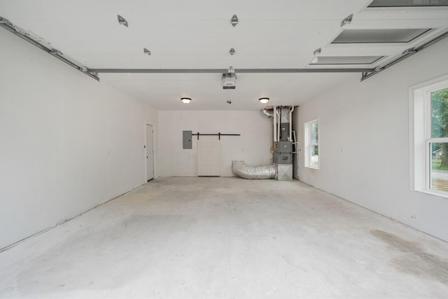 503 Valley View St, Carl Junction, MO 64834 - garage featuring electric panel and a garage door opener