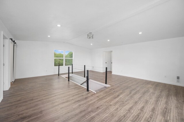 503 Valley View St, Carl Junction, MO 64834 - empty room with wood finished floors, lofted ceiling, and recessed lighting