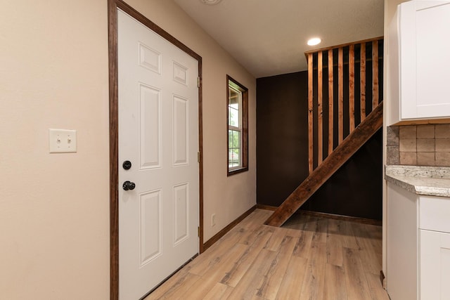 311 College St, Crane, MO 65633 - foyer entrance featuring light wood-type flooring and recessed lighting