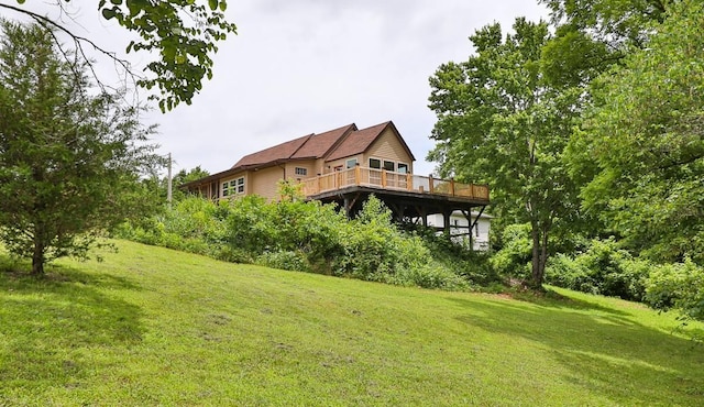 311 College St, Crane, MO 65633 - view of grassy yard featuring a deck