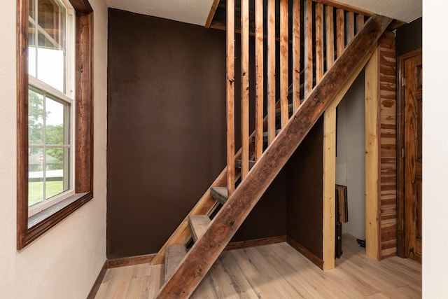 311 College St, Crane, MO 65633 - stairs with wood finished floors
