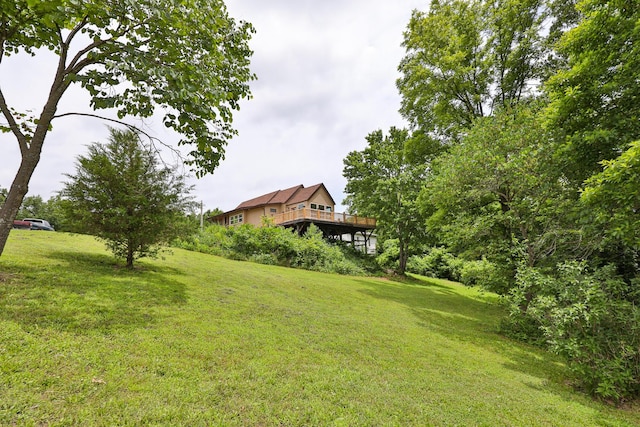 311 College St, Crane, MO 65633 - view of grassy yard featuring a deck