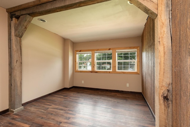 311 College St, Crane, MO 65633 - spare room featuring dark wood-style floors and baseboards