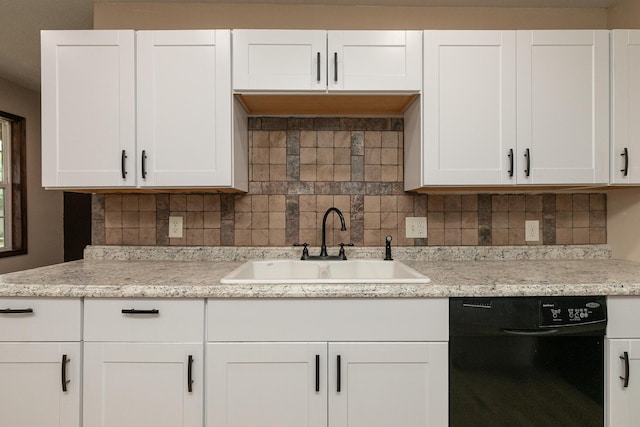 311 College St, Crane, MO 65633 - kitchen with dishwasher, white cabinets, tasteful backsplash, and light stone countertops