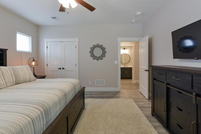 280 Lakefront Dr, Branson, MO 65616 - bedroom featuring light wood-style flooring, a closet, and ceiling fan
