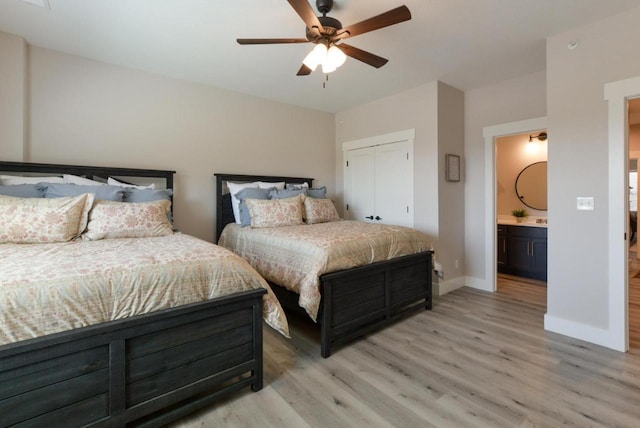 280 Lakefront Dr, Branson, MO 65616 - bedroom with light wood-style flooring, a closet, ceiling fan, and ensuite bathroom