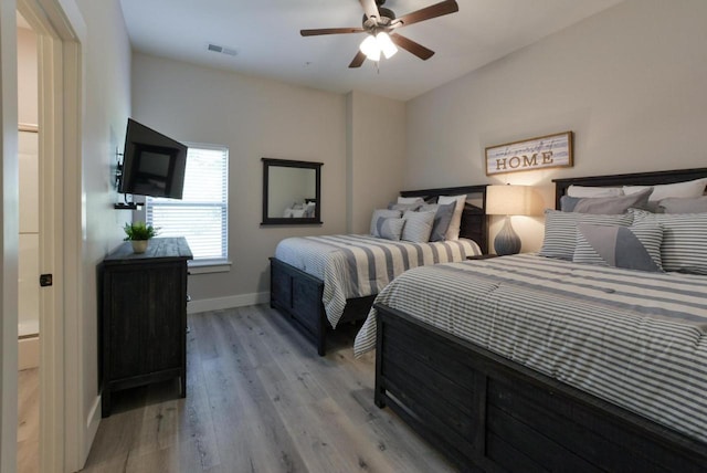 280 Lakefront Dr, Branson, MO 65616 - bedroom with light wood-style flooring and a ceiling fan