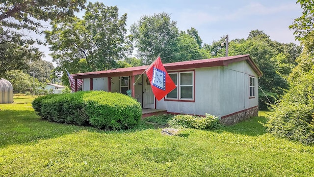 167 Timber Valley Rd, Mammoth Spring, AR 72554 - view of front of home with a front yard and a metal roof