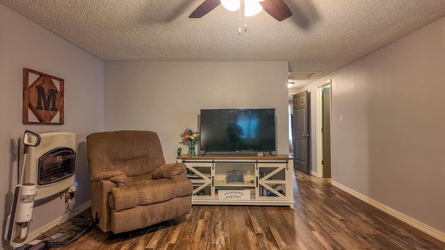 185 Timber Valley Rd, Mammoth Spring, AR 72554 - living area featuring wood finished floors, ceiling fan, and a textured ceiling