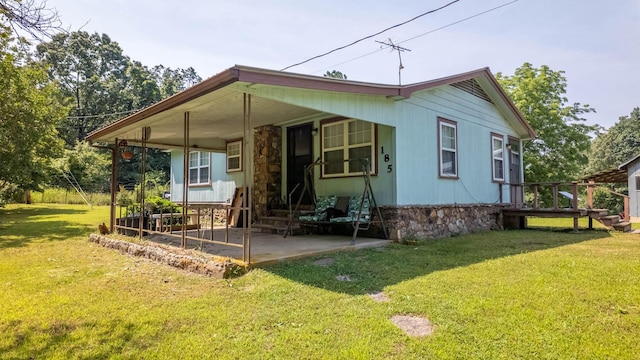 185 Timber Valley Rd, Mammoth Spring, AR 72554 - view of front of property with a front yard and a patio area