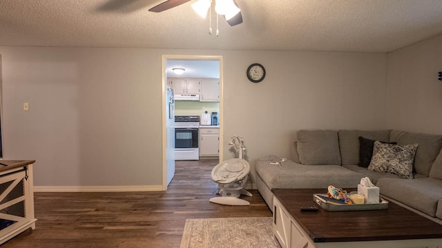 185 Timber Valley Rd, Mammoth Spring, AR 72554 - living room featuring dark wood-style flooring, a ceiling fan, and a textured ceiling