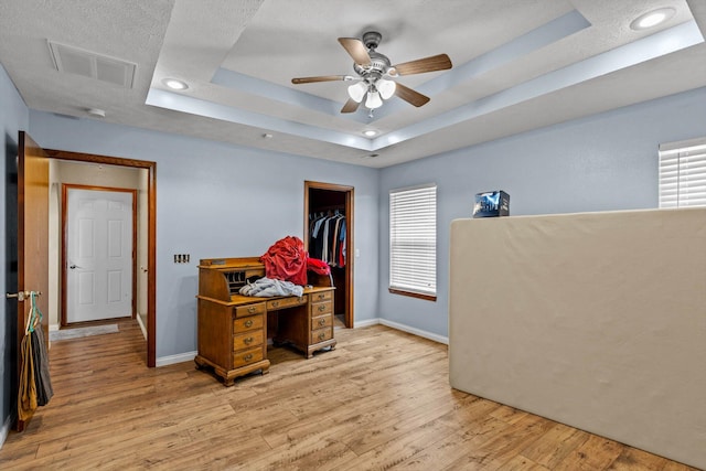 107 W Summit St, Aurora, MO 65605 - office area featuring a raised ceiling, light wood finished floors, a ceiling fan, and recessed lighting