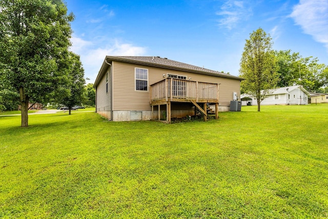 107 W Summit St, Aurora, MO 65605 - rear view of property featuring a deck and a lawn