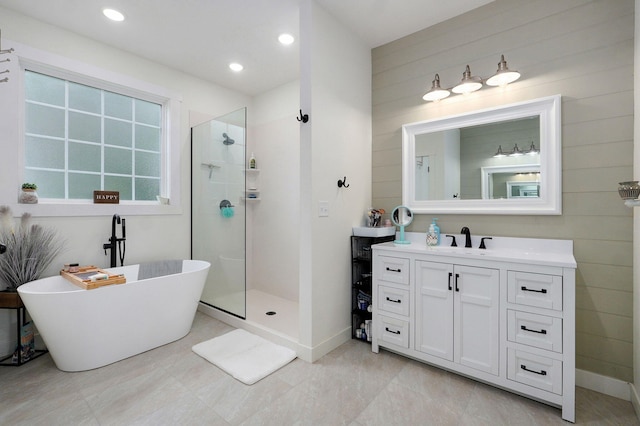 4360 State Highway Ww, Verona, MO 65769 - bathroom featuring vanity, a soaking tub, walk in shower, and wooden walls