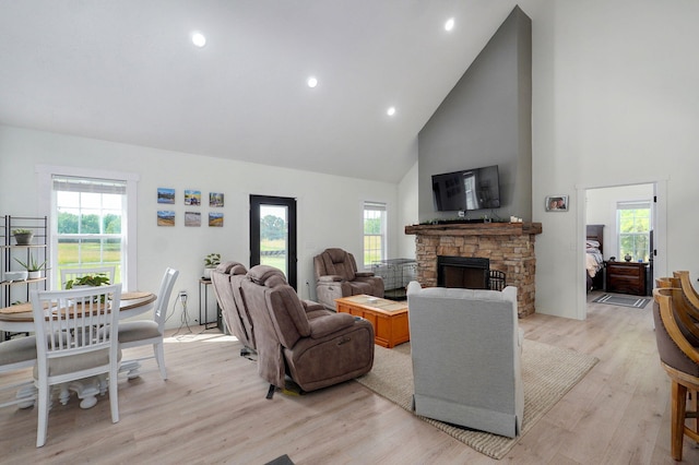 4360 State Highway Ww, Verona, MO 65769 - living room featuring high vaulted ceiling, light wood-style flooring, a fireplace, and recessed lighting