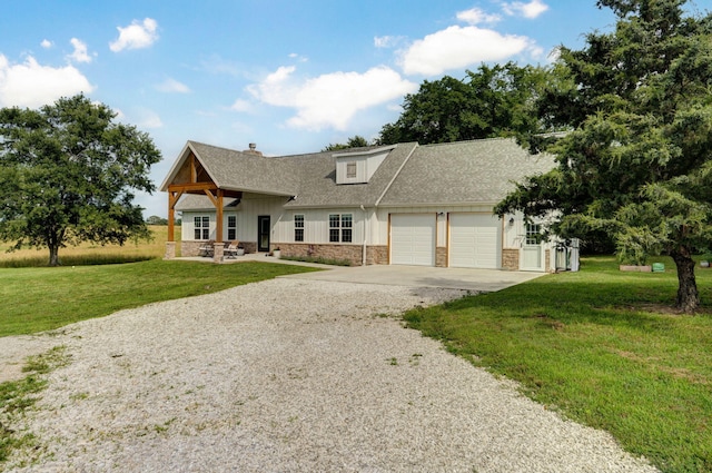 4360 State Highway Ww, Verona, MO 65769 - view of front of house featuring concrete driveway, a garage, a front lawn, and stone siding