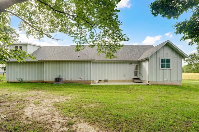 4360 State Highway Ww, Verona, MO 65769 - rear view of house with entry steps, board and batten siding, a lawn, and roof with shingles