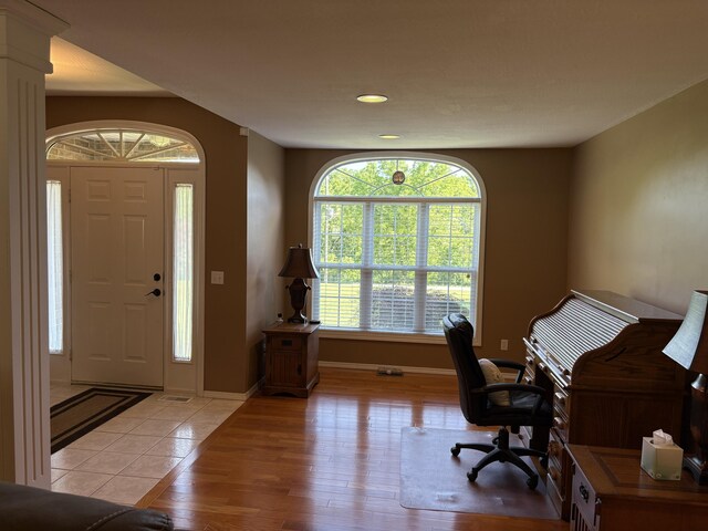 4849 W Rose Hill Rd, Billings, MO 65610 - office space featuring light wood-style floors, plenty of natural light, recessed lighting, and ornate columns