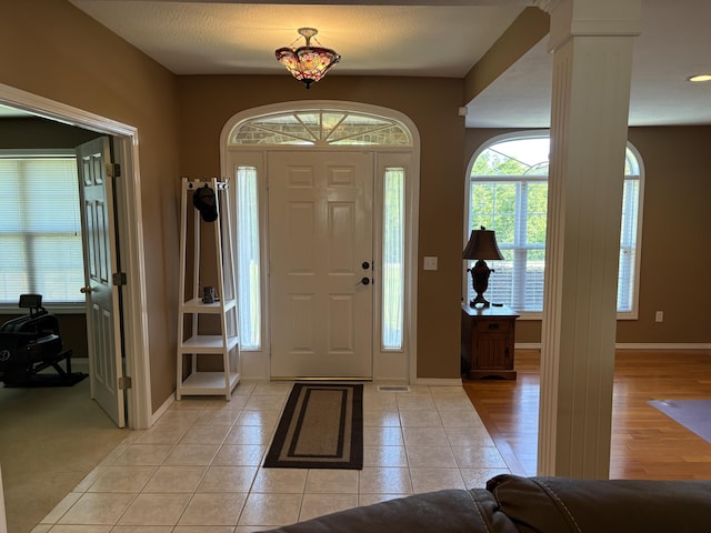 4849 W Rose Hill Rd, Billings, MO 65610 - entryway with light tile patterned flooring and ornate columns