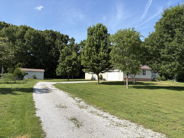 4849 W Rose Hill Rd, Billings, MO 65610 - view of front of home with driveway and a front yard