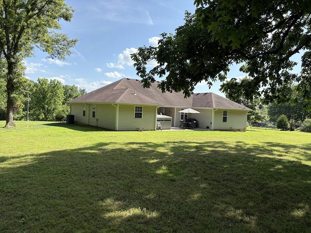 4849 W Rose Hill Rd, Billings, MO 65610 - back of property featuring a yard and a patio
